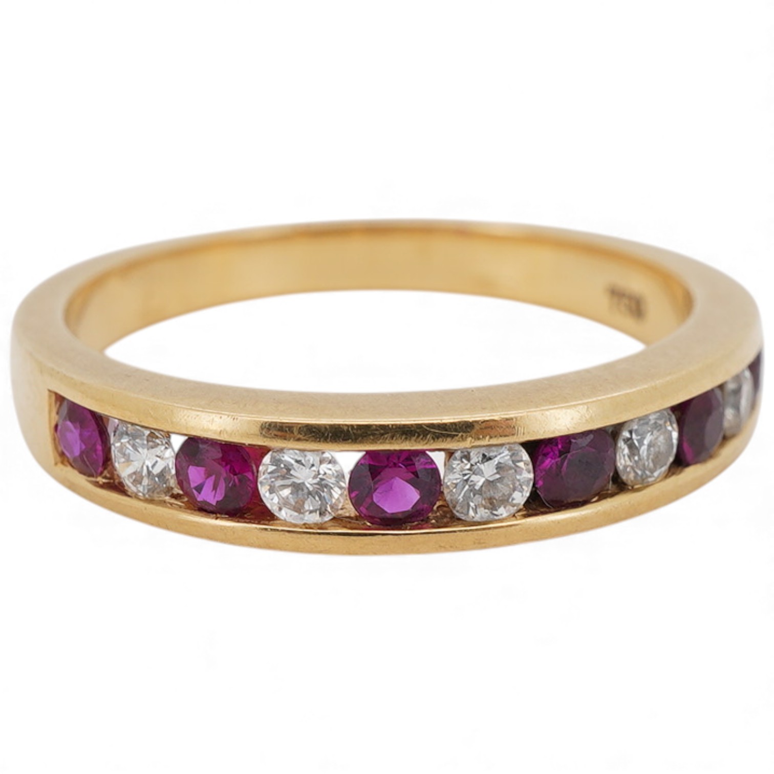 A recent 18k yellow metal, six stone ruby and five stone diamond set half hoop ring, size N, gross weight 3.8 grams.